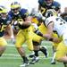 Michigan running back Thomas Rawls carries the ball for yards during spring practice at Michigan Stadium on Saturday, April 13, 2013. Melanie Maxwell I AnnArbor.com